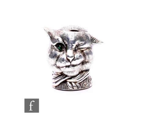 An Edwardian novelty hallmarked silver inkwell in the form of a winking cat in the manner of Louis Wain, with green glass eye