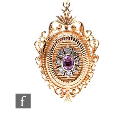 A 9ct hallmarked oval fancy locket set with central oval amethyst, weight 5.5g, length 5.5cm.