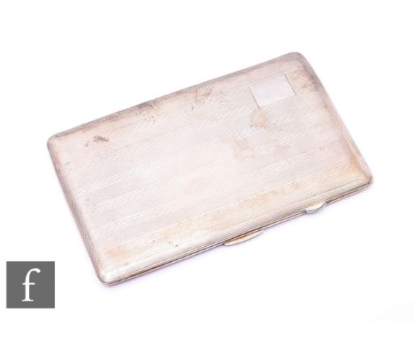 A hallmarked silver rectangular cigarette case with engine turned decoration, weight 6oz, Birmingham 1945.
