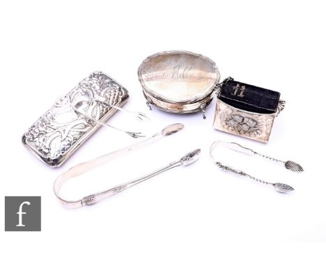 A small parcel lot of assorted hallmarked silver items to include a trinket box, a prayer book holder, a purse and three pair