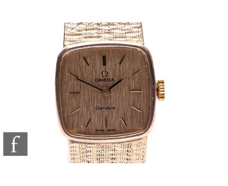 A 1970s Omega Geneve lady's 9ct gold wristwatch, the square shaped dial in a brushed finish with baton numerals, manual wind 