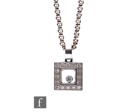 An 18ct gold Chopard 'Happy Diamonds' pendant necklace, the white gold trace chain suspending a square section diamonds set p