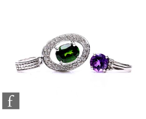 Two 9ct white gold pendants, comprising an amethyst and diamond example 6mm in size, stamped 375, and an oval chrome diopside