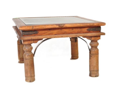 A contemporary Indian hardwood and glass side / lamp table inset with lattice worked cast iron panels under glass. The hardwo