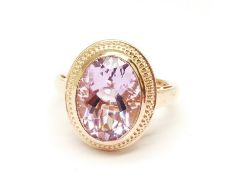 A silver gilt, Rose de France amethyst solitaire ring, R 