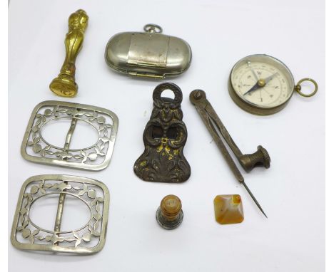 Two desk seals, a compass, a sovereign/stamp case, a buckle, etc. 