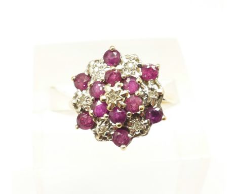 A 9ct gold, ruby and diamond cluster ring, 3.4g, O 