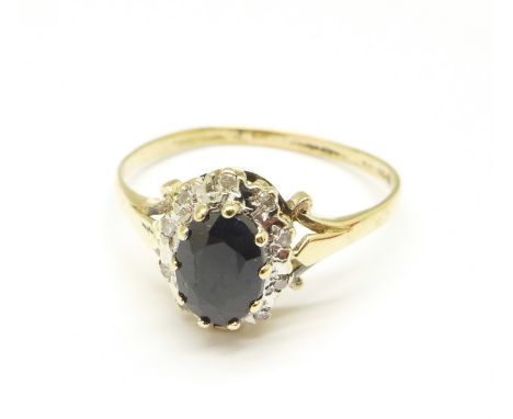 A 9ct gold, sapphire and diamond cluster ring, 1.7g, R 