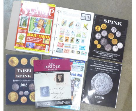 An album of stamps, stamp publications and coin catalogues 