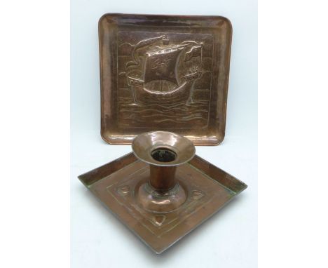 A Newlyn copper dish and an Arts and Crafts candlestick 