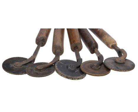 * Finishing tools. A selection of decorative rolls, fillets and pallets etc., comprising four decorative rolls (including one