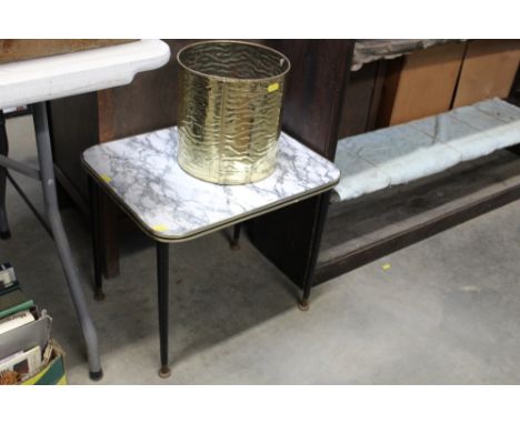 A faux marble vintage side table and bin
