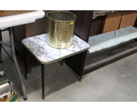 A faux marble vintage side table and bin