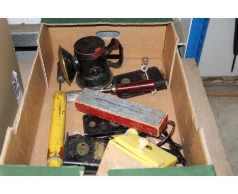 A box containing various door locks and vintage hand held lamp; a boxed hat iron etc