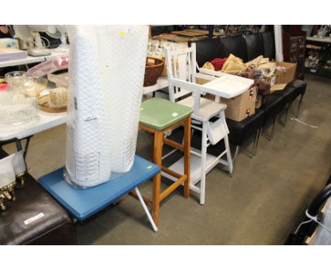 A white painted metamorphic high chair, a folding table  and a vintage stool