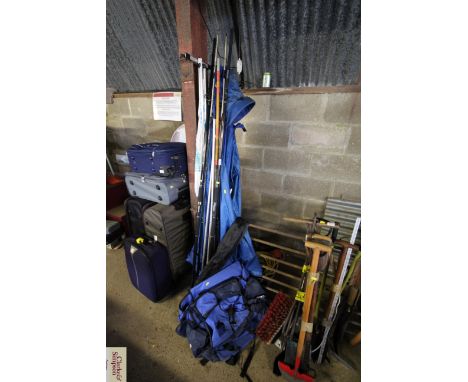 Two Daiwa Mean Streak two piece fishing rods; a rod rest; a Tilley lamp rest; a Beach Buddy; and a large fishing rucksack