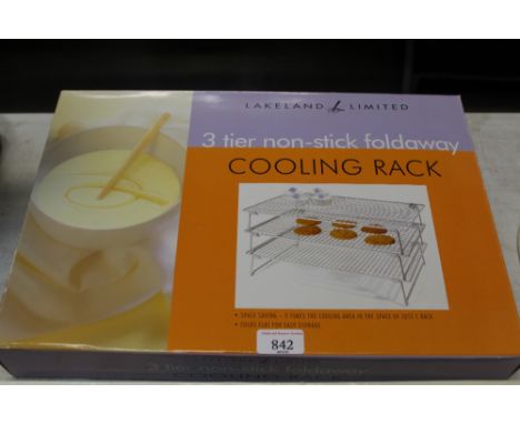 A Lakeland Ltd three tier non-stick fold away cooling rack with original box