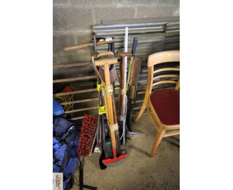 A quantity of garden tools to include forks, spades, shears etc.