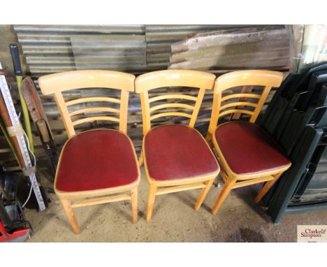 Three ladder back chairs 