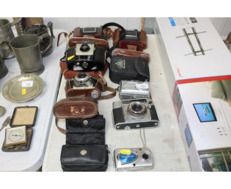 A quantity of vintage cameras and others
