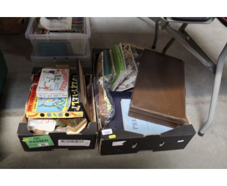 An empty postcard album, small case, various vintage puzzles, gloves, playing cards, books relating to East Anglia and others
