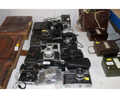 A quantity of various vintage and other cameras