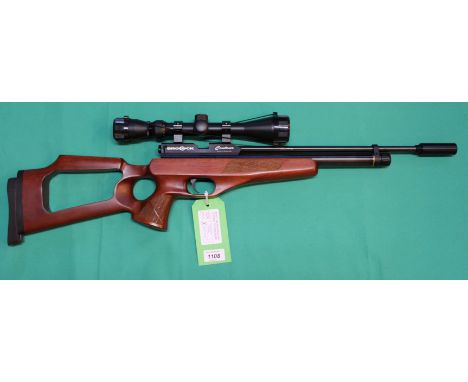 A Brocock .177 P.C.P. Contour air rifle with Nikko Sterling 4-12x40 scope, padded slip and 'fill pipe', S/No.8141, overall in