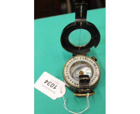 A WWII MkIII marching compass dated 1940