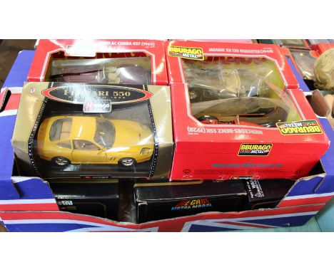 Boxed large scale model cars, Burago etc