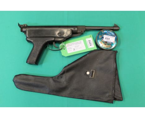 A .177 air pistol with holster and pellet tin with contents, as a post 1939 air weapon the restrictions of the Crime Reductio