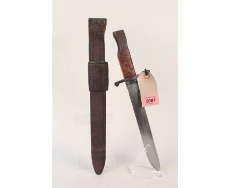 A Canadian 1st model 1907 Ross bayonet with leather scabbard with U.S.A. issue stamps