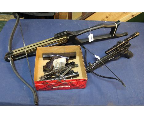 A Commando crossbow with a Barnet Trident 'hand held' mini crossbow with 'parts' of an air pistol