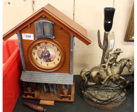 A John Wayne cuckoo clock plus a table lamp