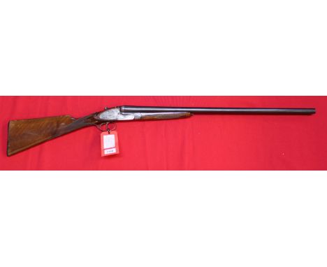A 12 bore S/S S/L/N/E shotgun with 28" barrels, a clean gun with good bores, S/No.19058, this item can only be purchased by s