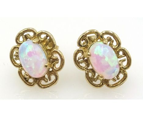 Pair of 9ct gold, filigree set opal stud ear-rings Condition Report Click here for further images, condition, auction times &