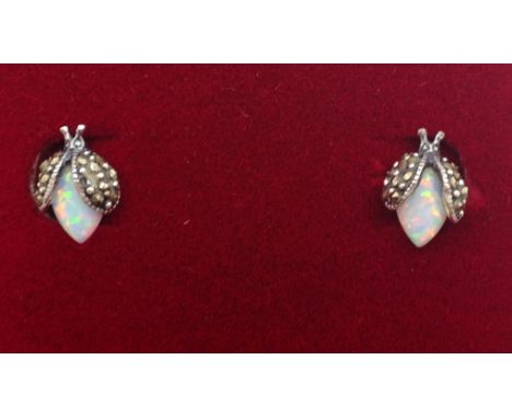 Pair of silver opal and marcastie insect ear-rings Condition Report Click here for further images, condition, auction times &