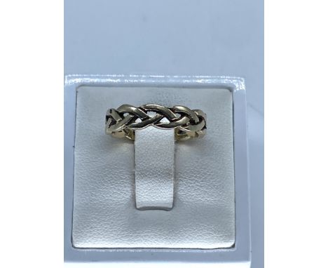 A 9ct yellow gold celtic band,size M,weight is 2.8 grams approx,thick shank,nice ring