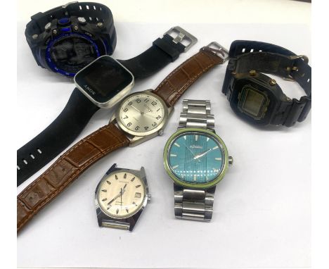 A collection of digital watches,including a vintage Casio