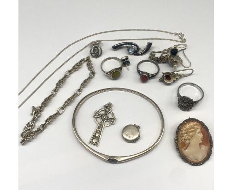 A mixed lot of silver items,silver bangle,celtic bracelet,iona silver marble ring,celtic pendant,silver earrings,silver locke