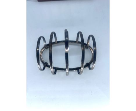 A vintage silver toast rack,95mm x 80mm high,fully hallmarked,53.5 grams in weight approx
