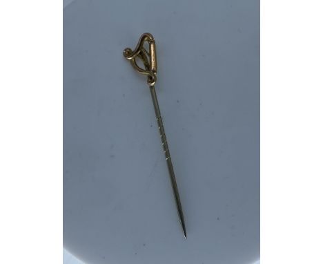 A 9ct yellow gold Victorian heart tie pin,0.7 grams in weight approx,pin is not gold,