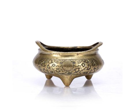 Bronze tripod censer/dingChinese, 18th/19th Centurywith raised loop handles, the side incised with three panels of taotie, sh