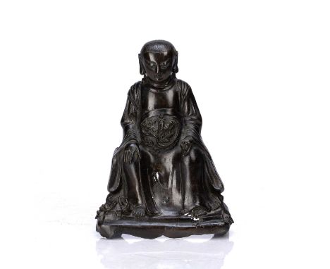 Bronze model of an emperor Chinese, Ming dynastydepicted in a meditation stance with both hands resting on the lap, 24.5cm hi