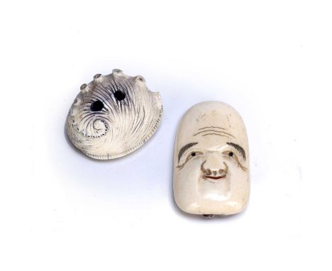 Two ivory netsukesJapanese, 19th Century/early 20th Centurycomprising of a Noh mask, signed to the reverse, 4.5cm, and an ivo