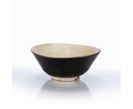 Seto ware tea bowl Japanese, 18th Centurybowl with a double interlocking circle on the inside bottom, 15.6cm acrossCondition 