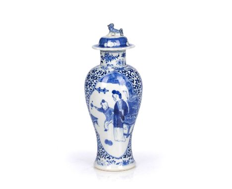 Blue and white porcelain vaseChinese, 19th Centurywith two panels of a mother and child, (with associated cover), Kangxi mark