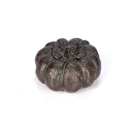 Bronze model of a pumpkinChinese, 18th/19th Centurywith ten lobes and a small stalk to the lid, 5cm high, 11cm acrossConditio