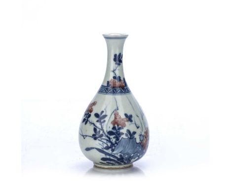 Imari decorated bottle vase Chinese, Kangxi Period decorated with flowers growing from a rocky outcrop, 14cm highCondition re