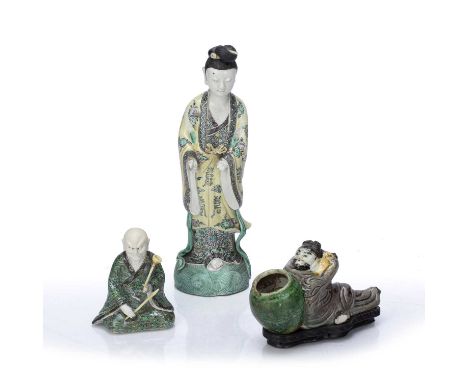 Three famille verte porcelain piecesChinese, Kangxi and latercomprising of a standing woman, standing on a rocky outcrop abov