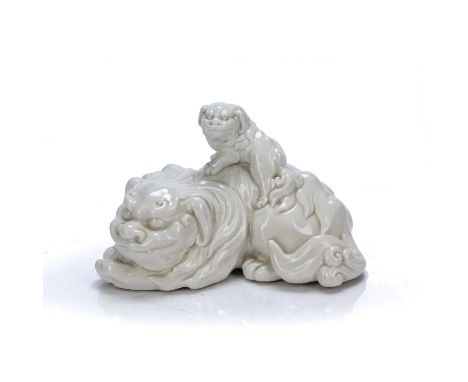 Dehua model of a lion and cubChinese, 18th Centurythe lion in a recumbent position with a cub riding on the back, 17cm across